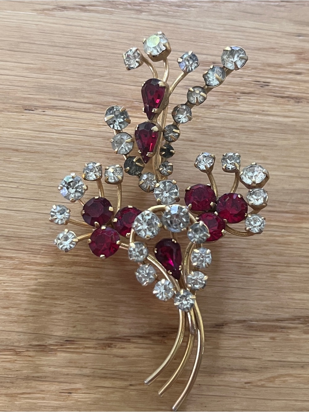 Vintage Gold-Tone Floral Brooch with Ruby Red and Clear Rhinestones